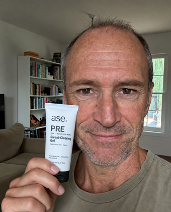 Graham holding his ASE skincare tube