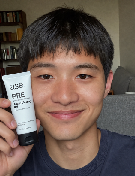 Kevin holding his ASE skincare tube